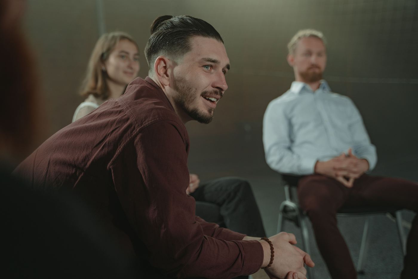A small group in discussion during a facilitated session